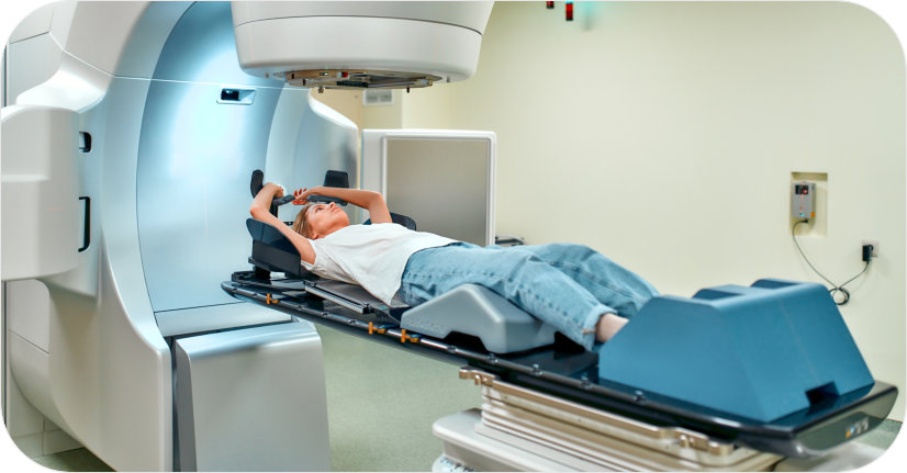 Patient lying on bed, ready for MRI scan in hospital setting