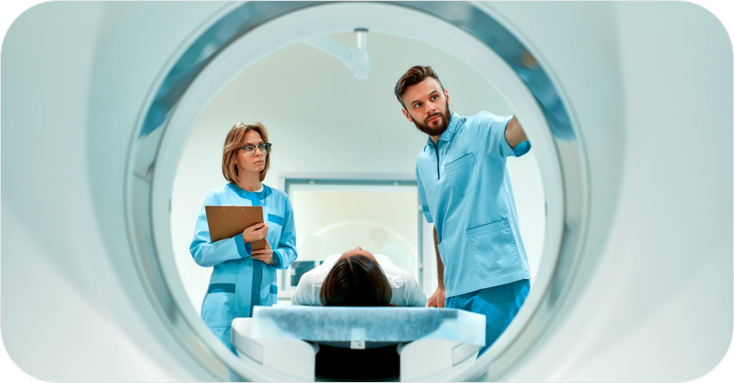 Patient lying on bed, ready for MRI scan in hospital setting